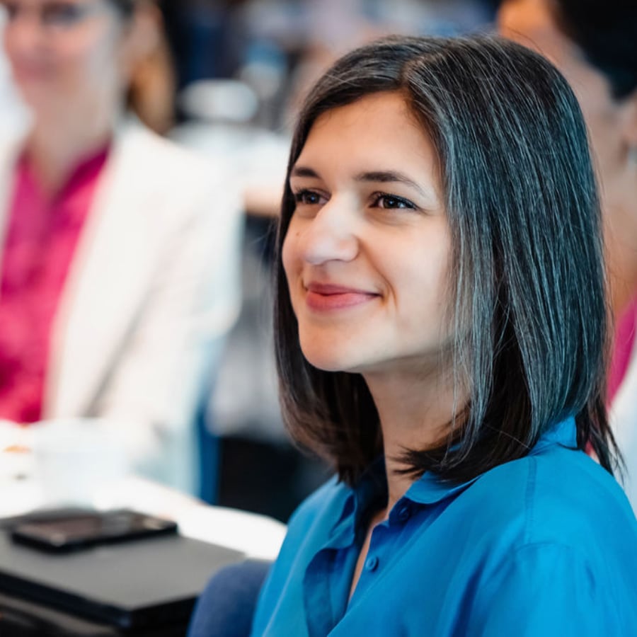 Woman With Blue Shirt Smiling