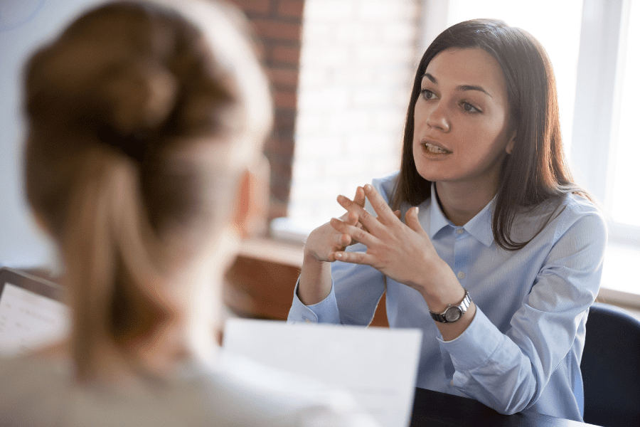 human resources manager talking to an employee