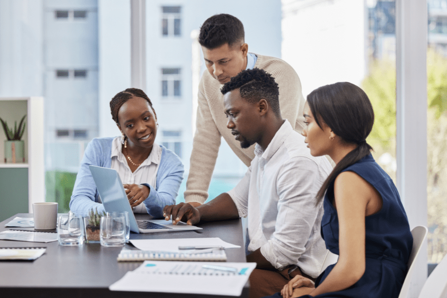 a group of business people in a meeting in Africa